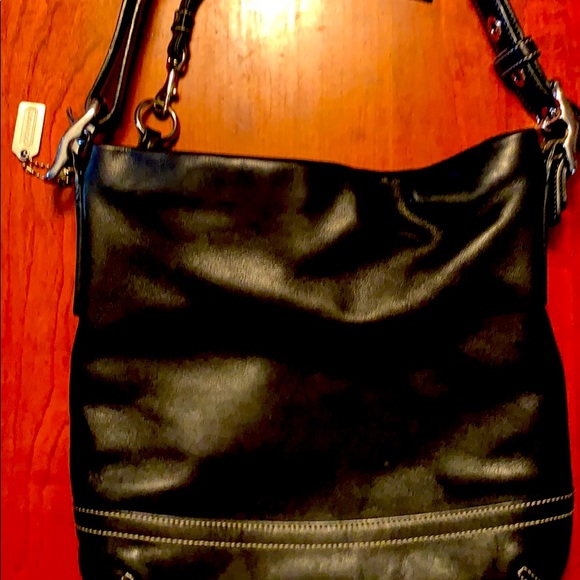 Authentic Coach crossbody/shoulder bag.